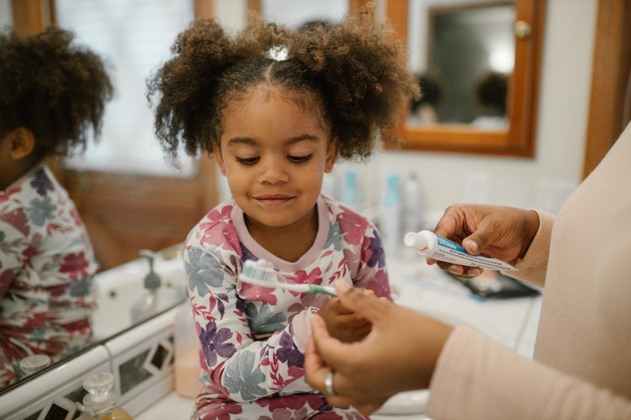 Child preparing to brush teeth