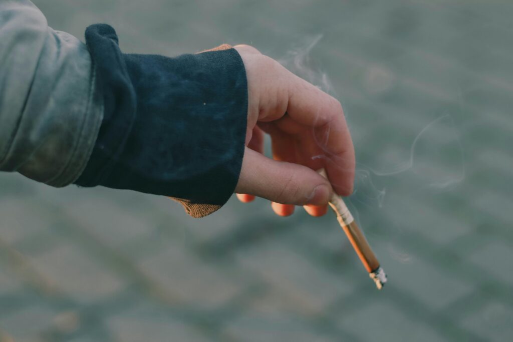Person holding a cigarette