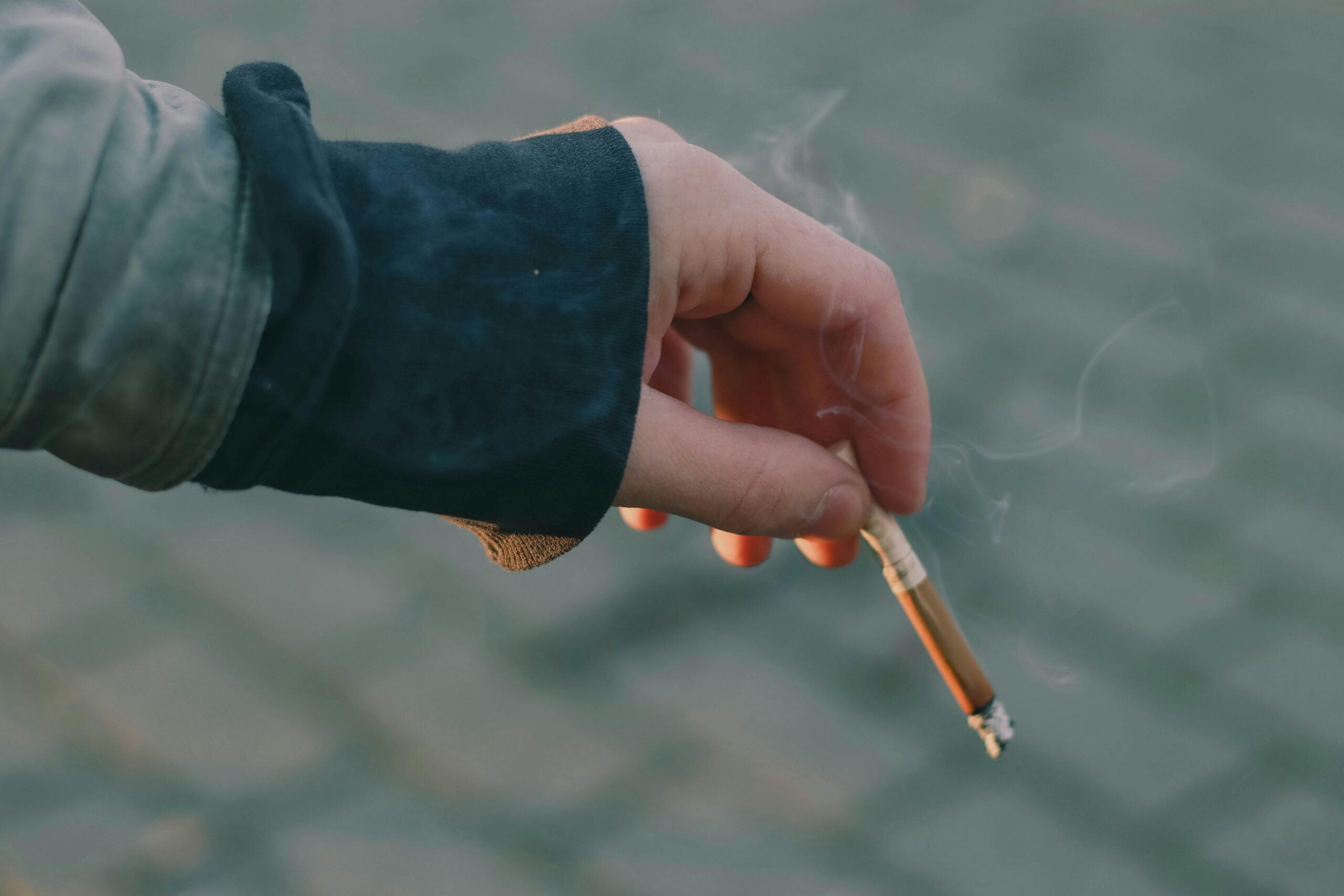 Person holding a cigarette