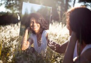 Woman smiling in a field