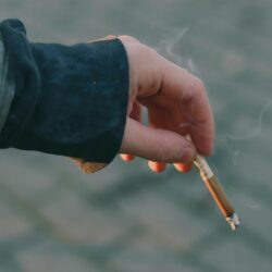 Person holding a cigarette